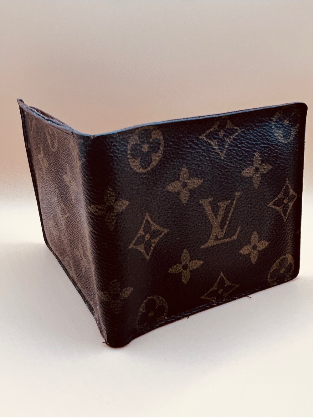 Louis Vuitton Monogram Canvas Bi-Fold Wallet in Brown